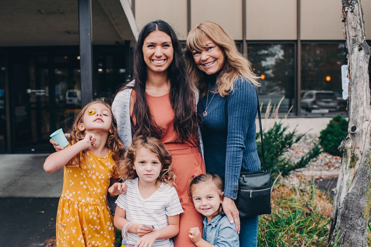 Golden Valley Moms - Mom and family standing outside of clinic together