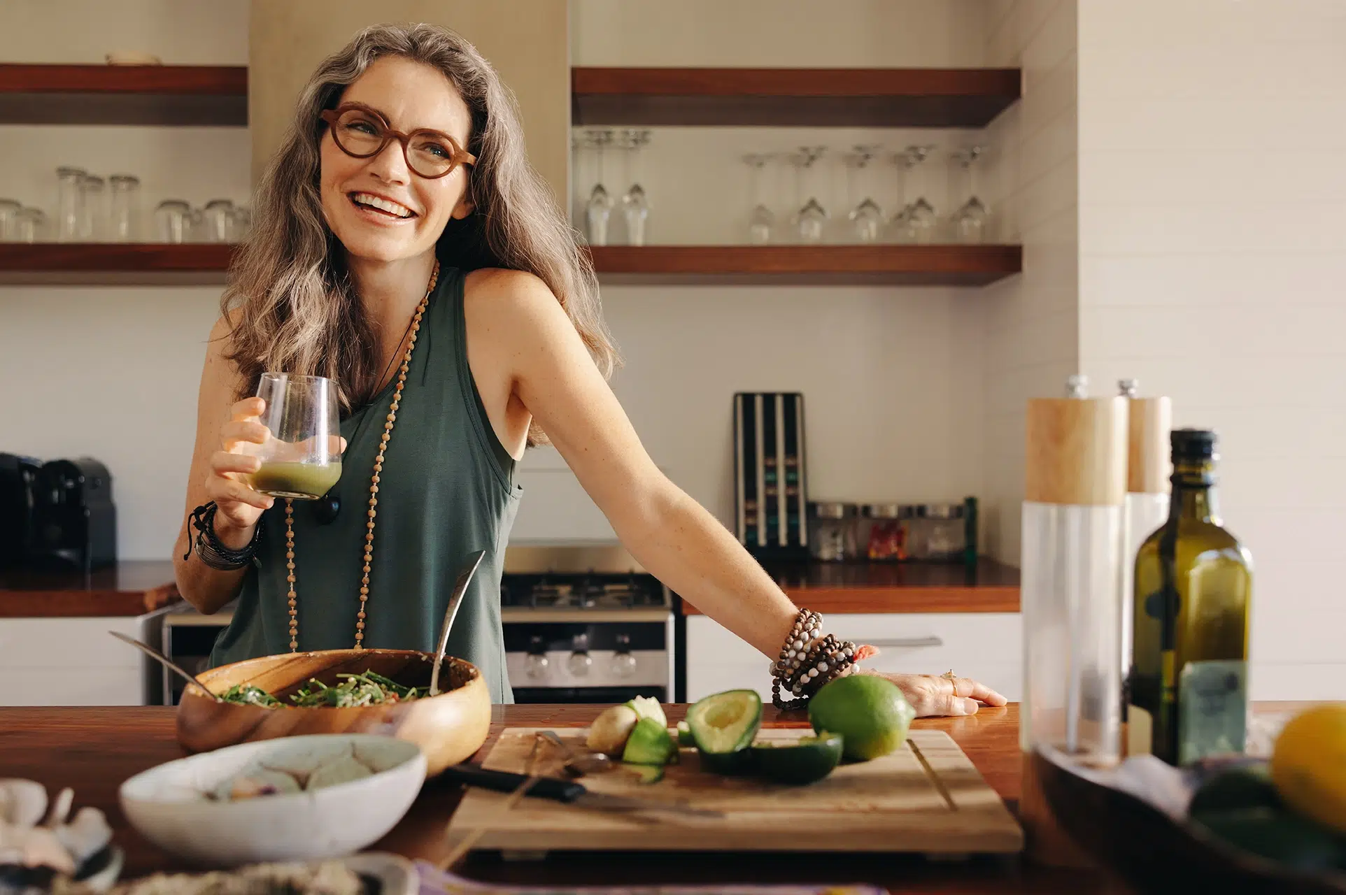 Smiling woman meal prepping a health meal for heart health and a happy smile.