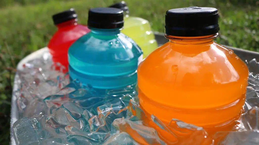 Colorful sports drinks on ice